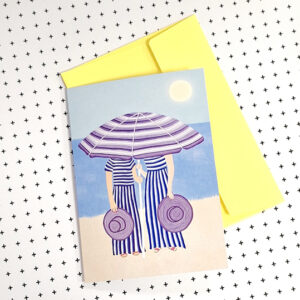 Kaart met illustratie van twee dames onder een parasol op het strand